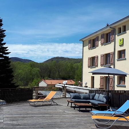 Logis La Rose Des Vents Hotel Volvic Bagian luar foto