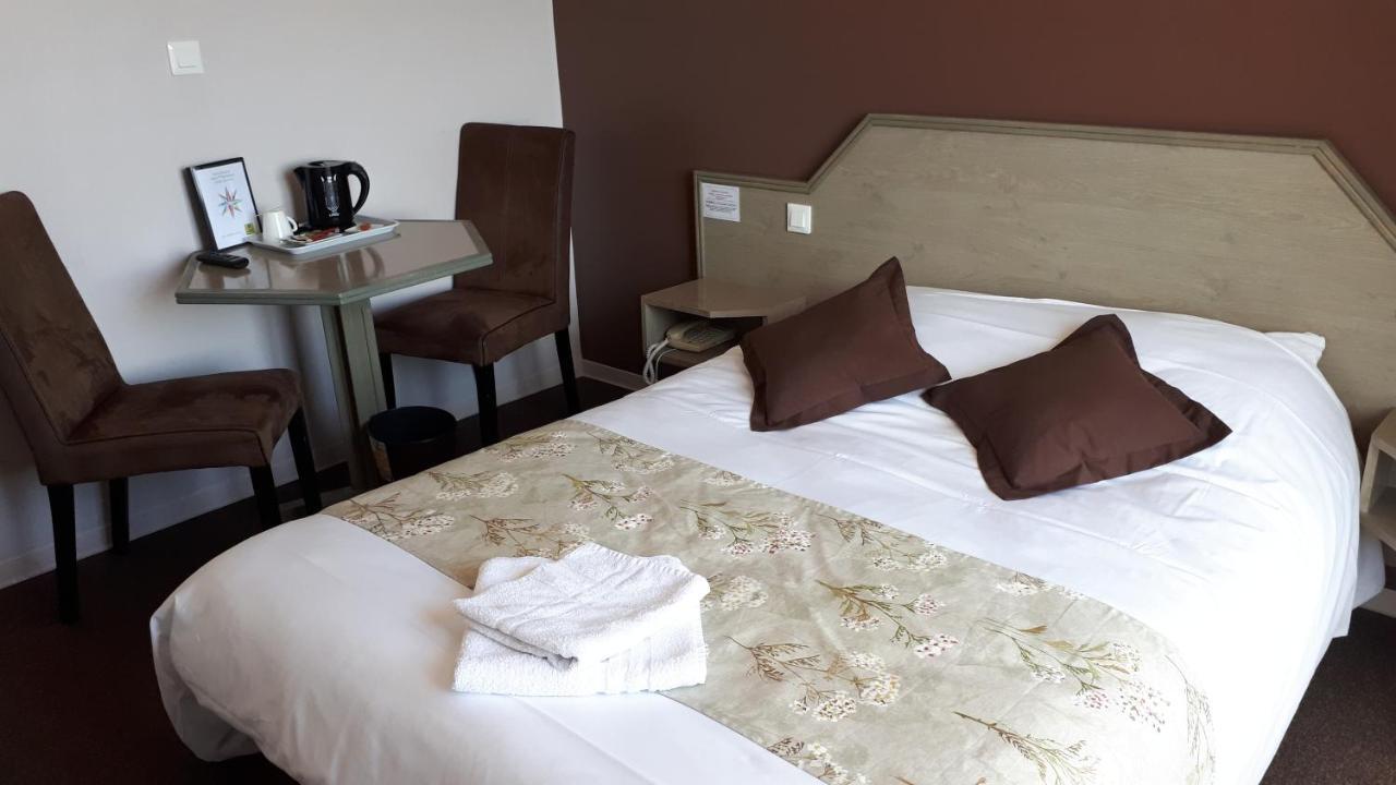Logis La Rose Des Vents Hotel Volvic Bagian luar foto